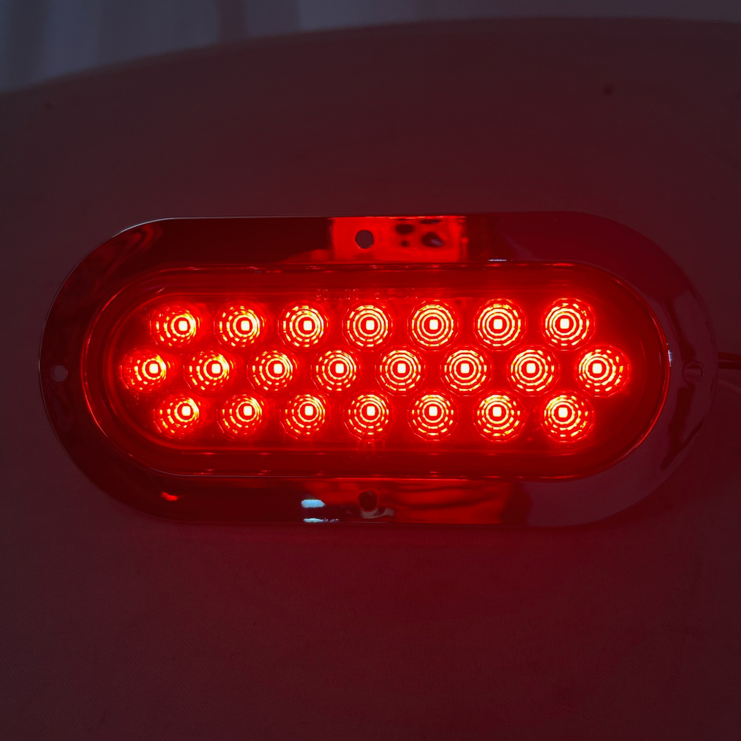 Oval Geometrical LED Light in Red W / Chrome Bezel